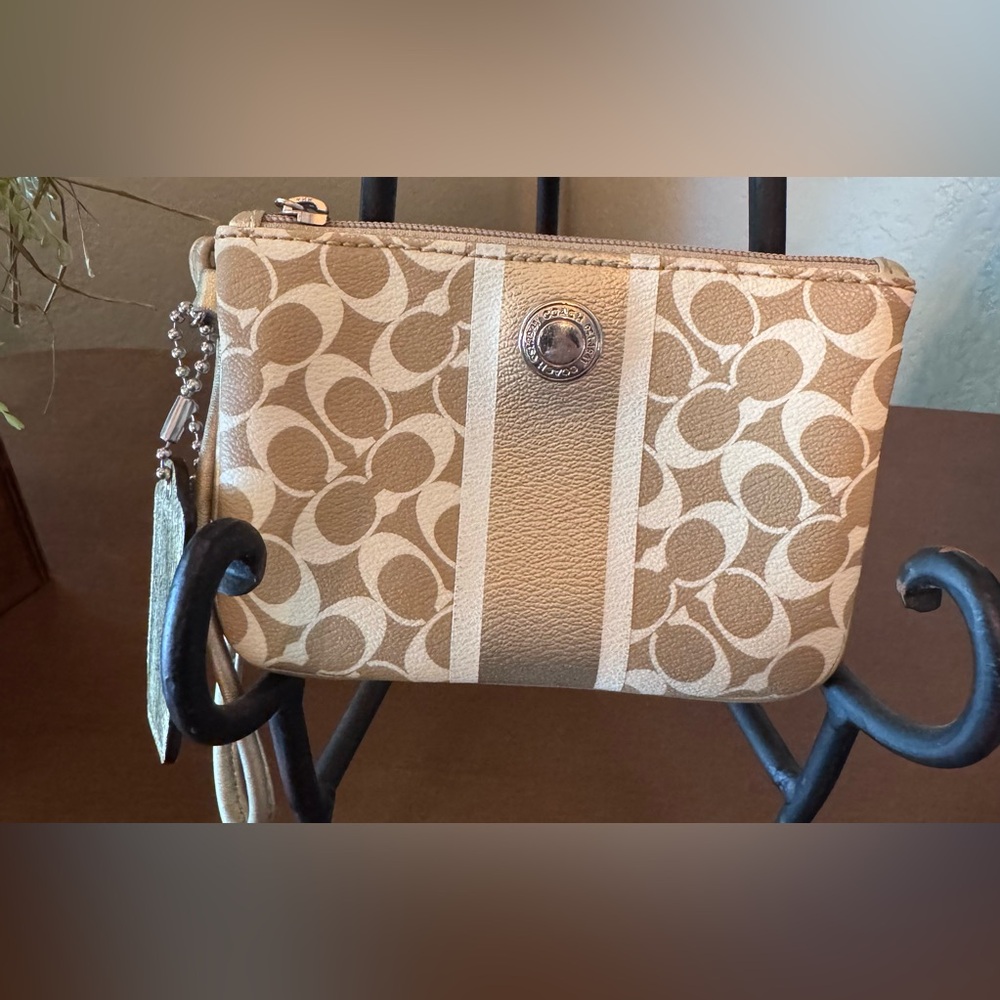 Coach Tan Clutch with Signature Monogram